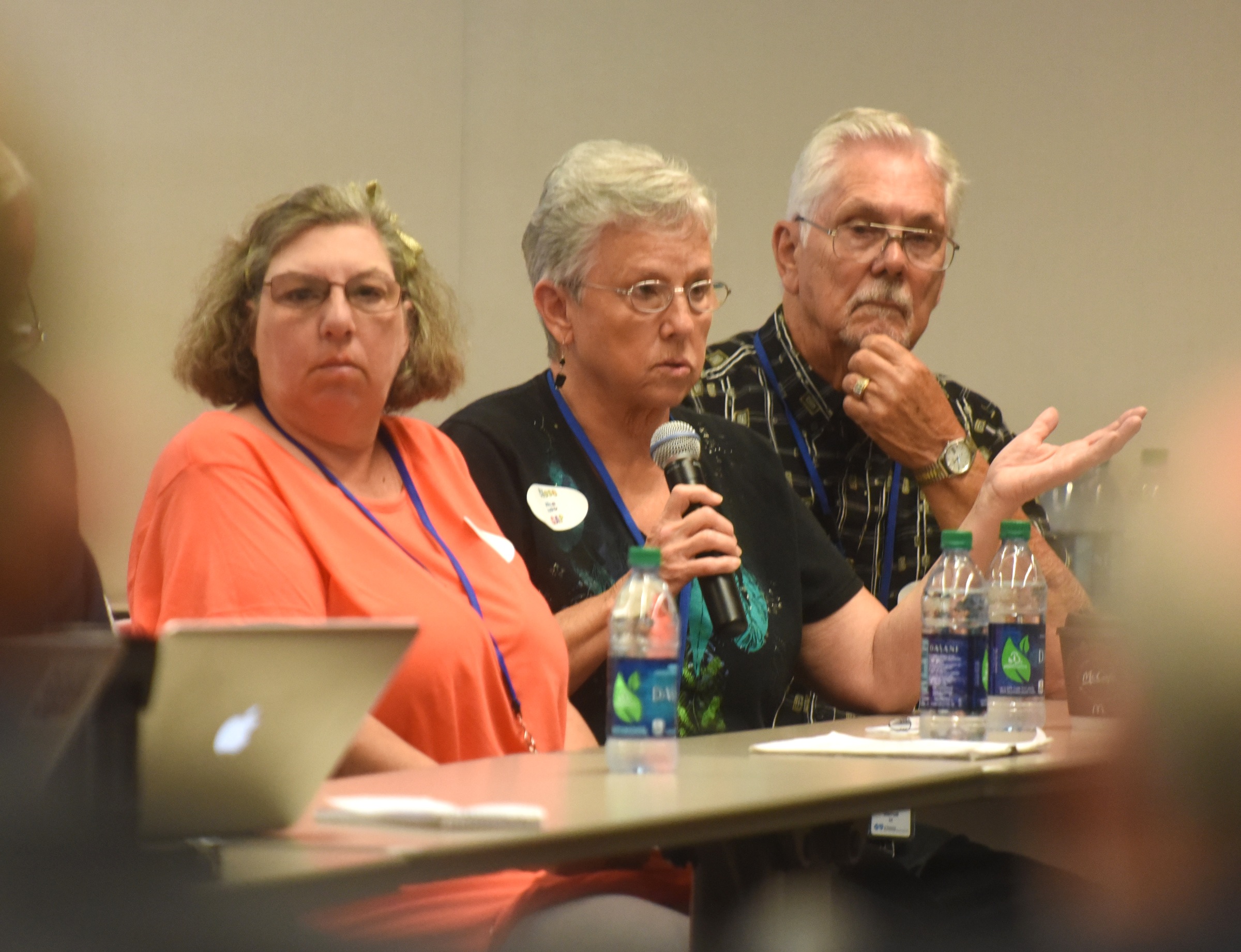 Shirley Bagwell, center, speaks during a state task force discussion on healthcare at BlueCross BlueShield on Tuesday, May 24, 2016 as husband David Bagwell, right, and daughter Cynthia Baker listen.