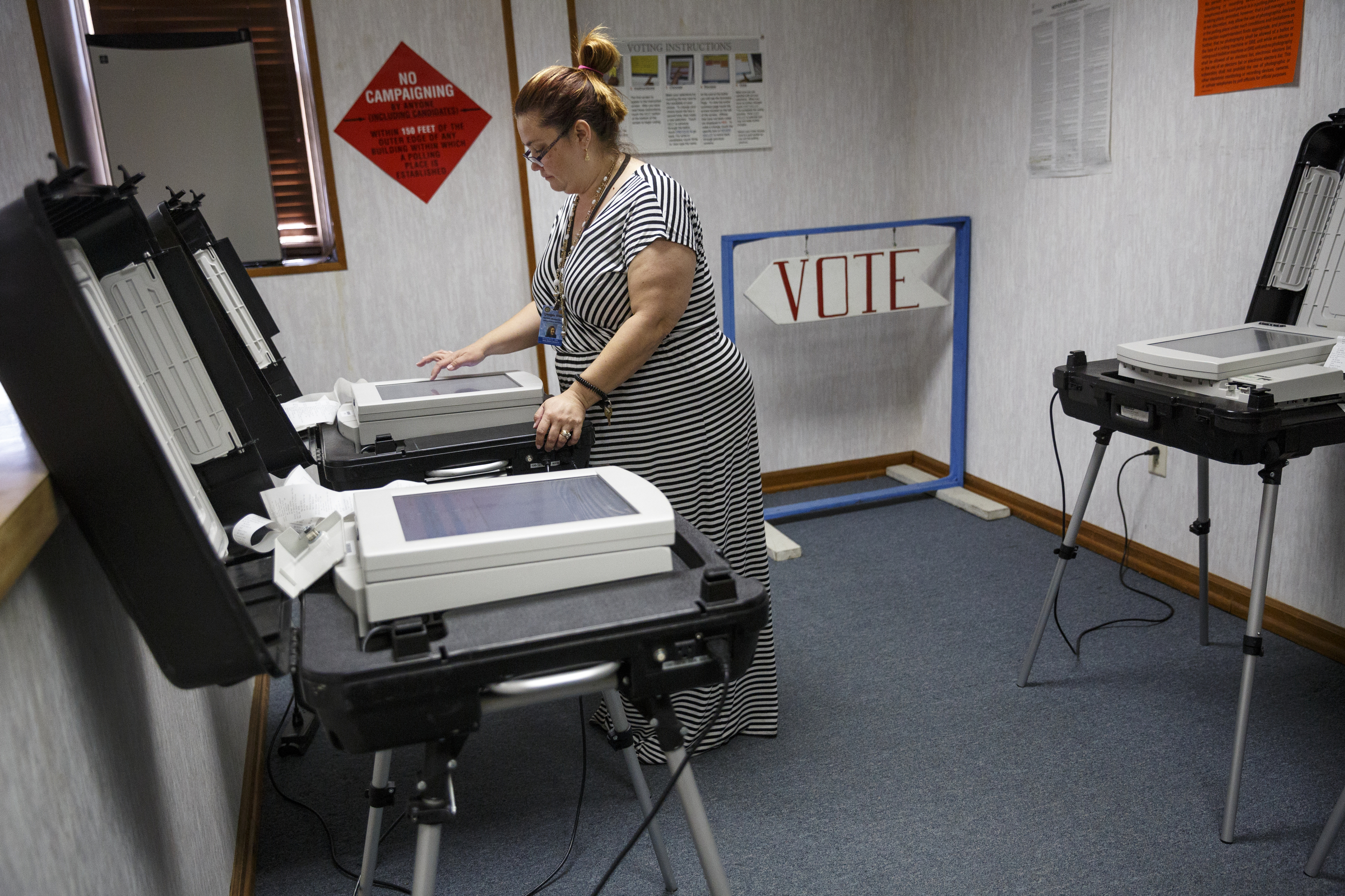 Walker county elections supervisor Danielle Montgomery readies early voting machines to be tallied on primary election night at the Walker County Courthouse Tuesday, May 24, 2016, in Lafayette, Ga. GOP primary candidate Shannon Whitfield beat opponent Mike Peardon for his party's nomination and will face incumbent and former GOP member Bebe Heiskell in the fall for Walker County's sole commissioner's seat.