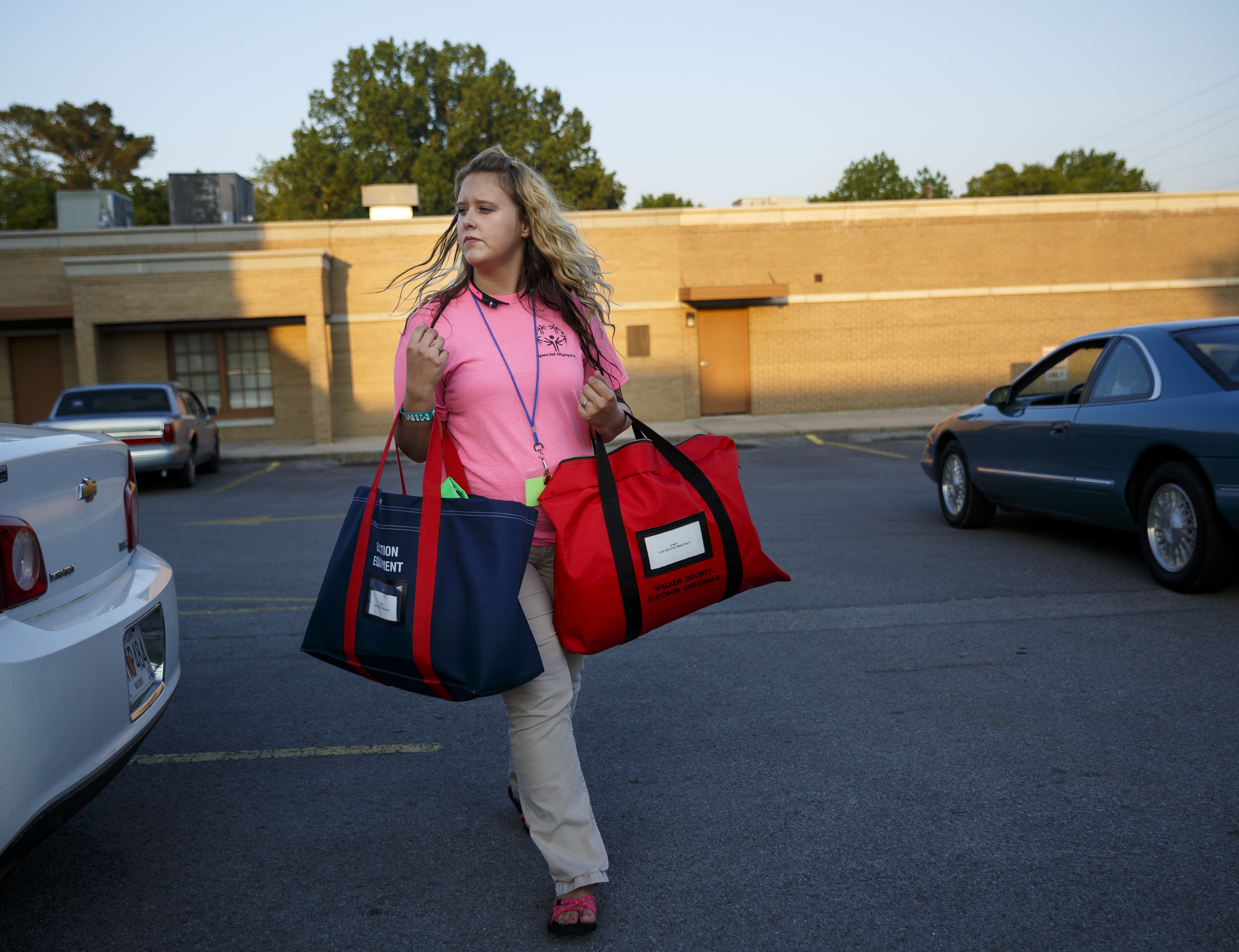 Election worker Brittany Richardson carries voting materials from a precinct into the Walker County Courthouse on primary election night Tuesday, May 24, 2016, in Lafayette, Ga. GOP primary candidate Shannon Whitfield beat opponent Mike Peardon for his party's nomination and will face incumbent and former GOP member Bebe Heiskell in the fall for Walker County's sole commissioner's seat.