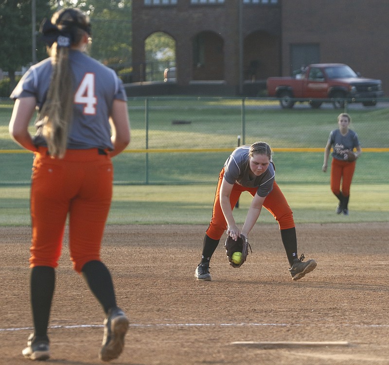 Staff Photo by Dan Henry / The Chattanooga Times Free Press- 5/24/16. Meigs County's Kaylie Moore (25) stops a ball in the infield and makes an out at first while playing Silverdale Baptist during the TSSAA Division I Class A Girls' Softball Tournament in Murfreesboro, TN., on May 24, 2016. 