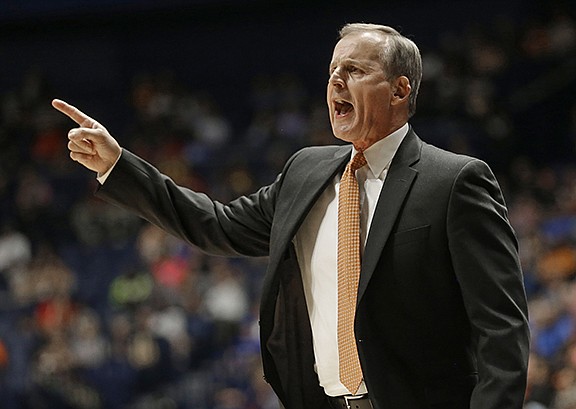 Tennessee head coach Rick Barnes directs his team against Auburn during the first half of an NCAA college basketball game in the Southeastern Conference tournament in Nashville, Tenn., Wednesday, March 9, 2016. (AP Photo/Mark Humphrey)