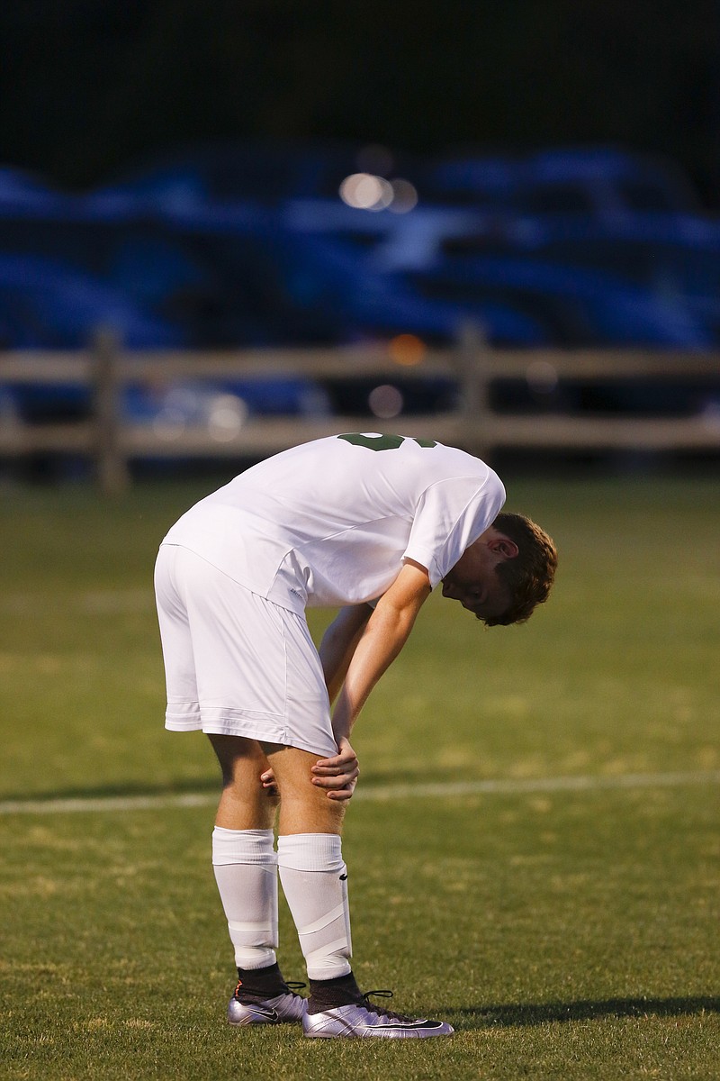 Staff Photo by Dan Henry / The Chattanooga Times Free Press- 5/24/16. Notre Dame's Justin Hensley (16) hangs his head as the whistle blows signifying the end of the 2016 TSSAA Class A-AA State Soccer tournament on May 24, 2016. The Fighting Irish lost to the Warriors with a final score of 2-3. 