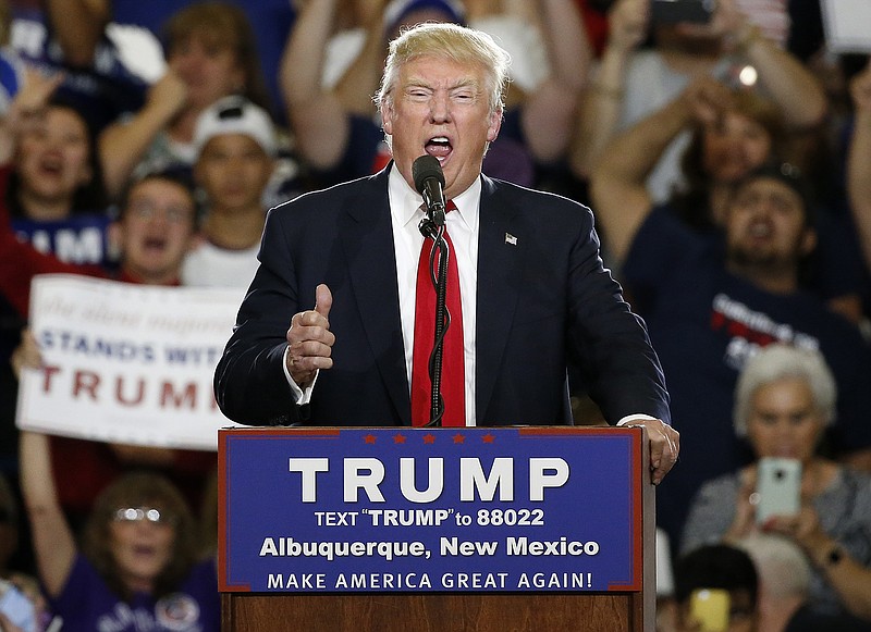 
              Republican presidential candidate Donald Trump speaks at a campaign event in Albuquerque, N.M., Tuesday, May 24, 2016. (AP Photo/Brennan Linsley)
            