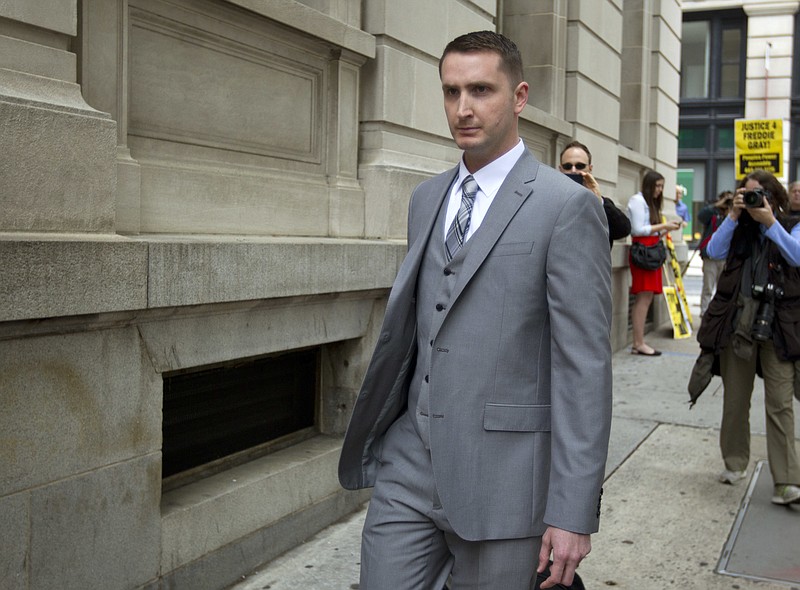 This May 12, 2016, file photo shows officer Edward Nero, one of six Baltimore city police officers charged in connection to the death of Freddie Gray, arriving at a courthouse at the beginning of his trial in Baltimore Md.