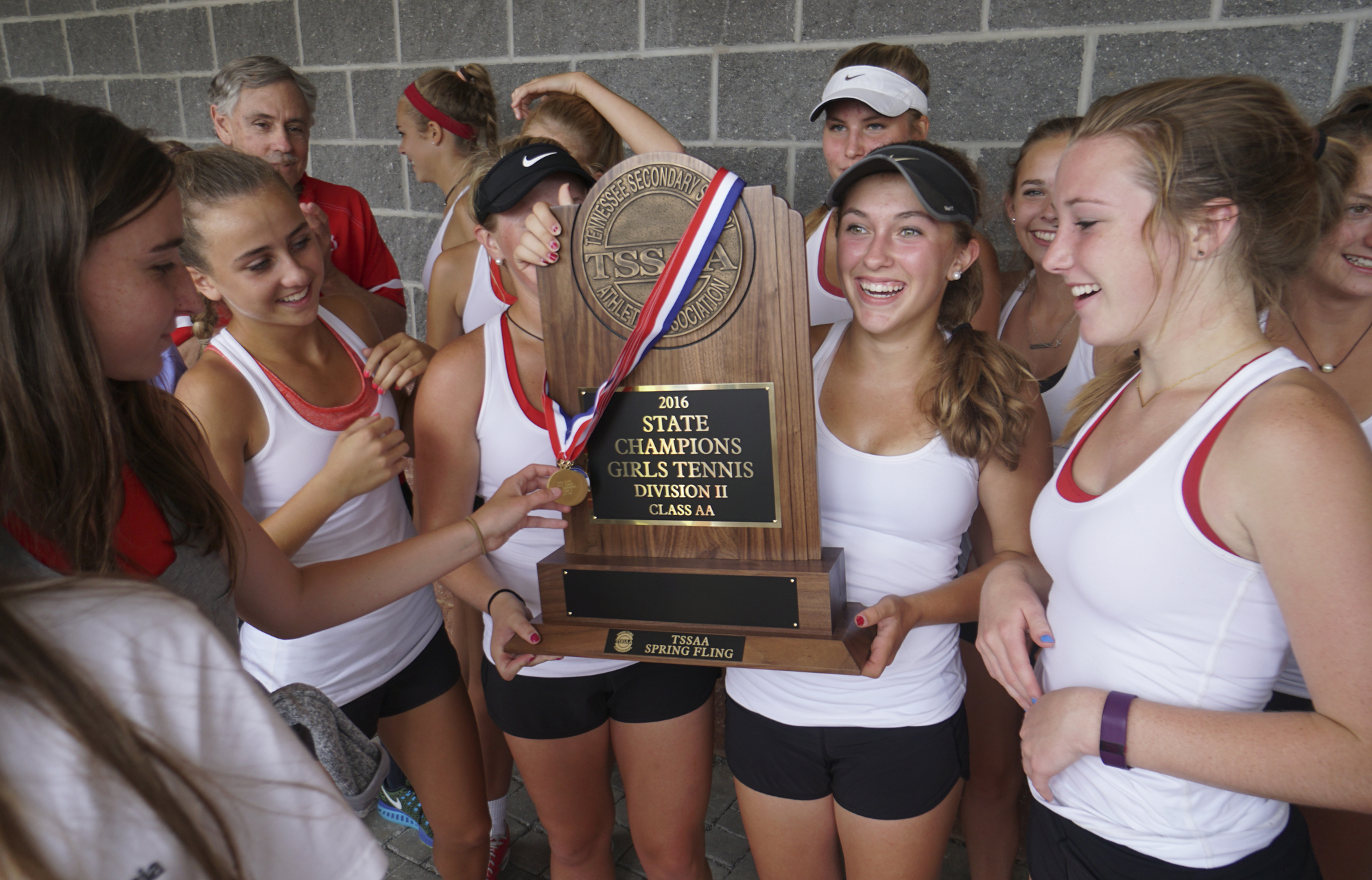 Staff Photo by Dan Henry / The Chattanooga Times Free Press- 5/25/16. Baylor School girls celebrate their win over Hutchison during the TSSAA Division II Class AA Girls' State Tennis Championships in Murfreesboro, TN., on May 25, 2016.