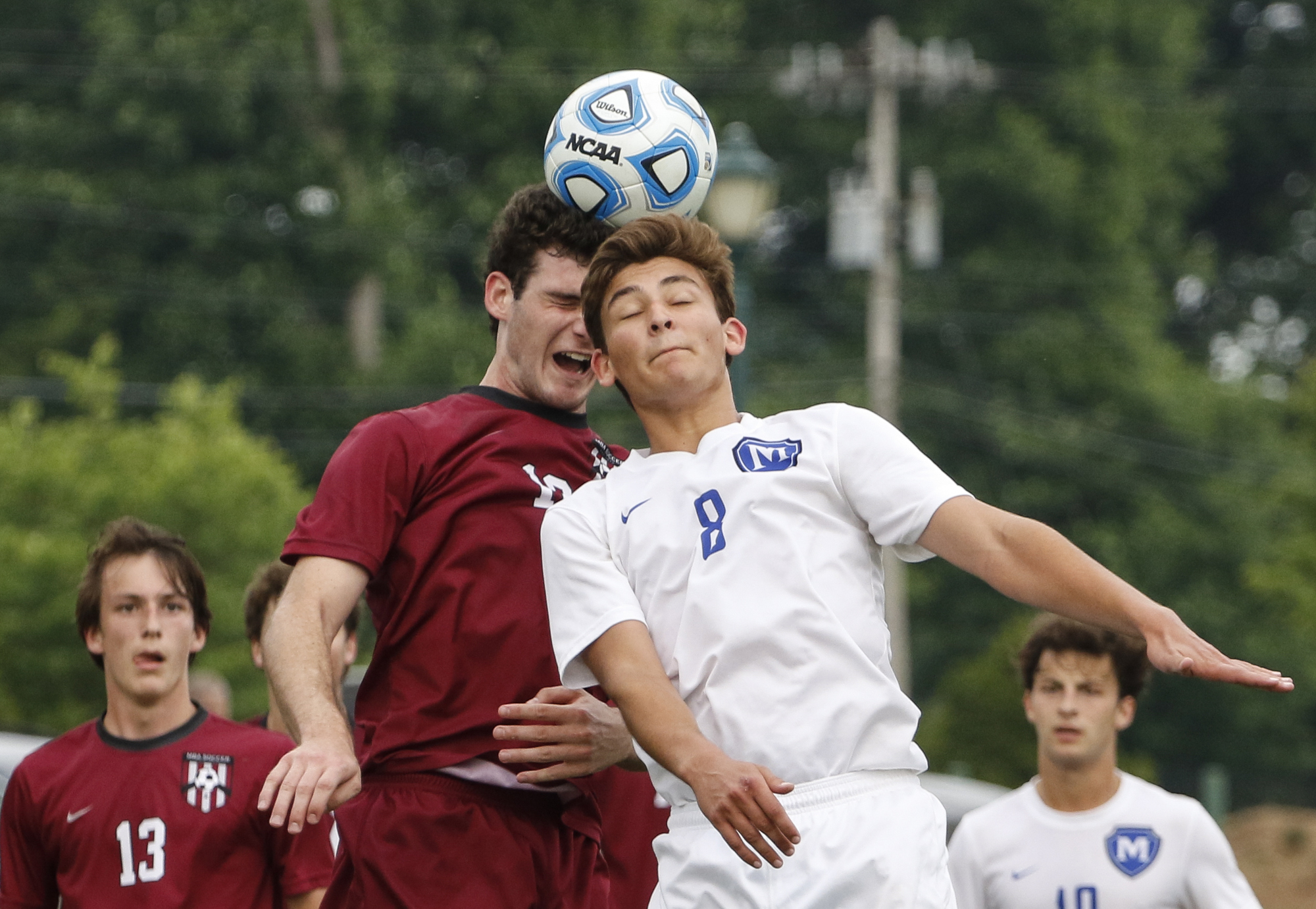 McCallie School's Will McGregor (8) and Montgomery Bell Academy's Collin Ragsdale battle for a header during a Division II-AA state semifinals match Wednesday in Murfreesboro.
