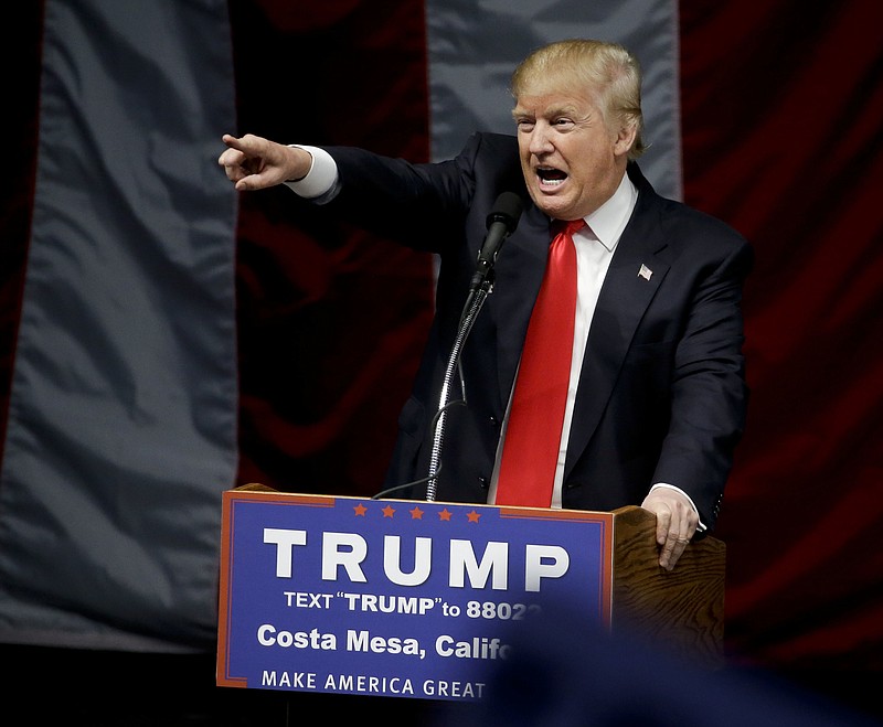 
              FILE - In this April 28, 2016 file photo, Republican presidential candidate Donald Trump speaks during a rally in Costa Mesa, Calif. Police are preparing for the possibility of protests at a Trump rally in Orange County Wednesday, May 25, 2016, after a similar event drew raucous anti-Trump demonstrations that blocked traffic and damaged police cars. (AP Photo/Chris Carlson, File)
            