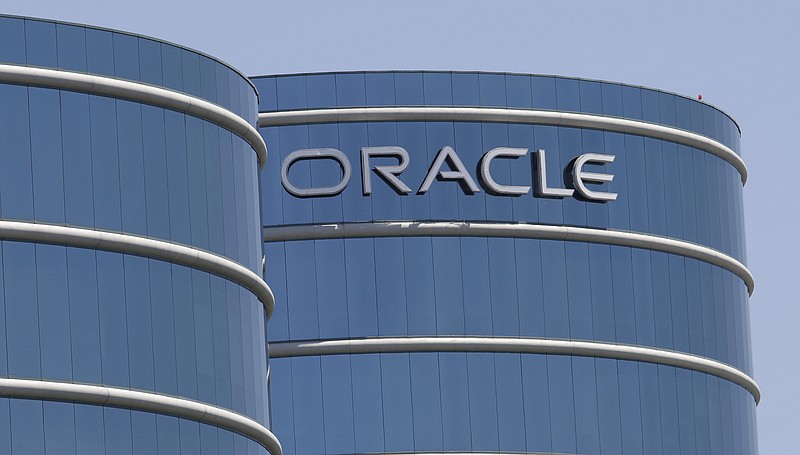 
              FILE - This Monday, June 18, 2012, file photo shows Oracle headquarters in Redwood City, Calif. Oracle's Mark Hurd was the highest-paid CEO in the state of California in 2015, as calculated by The Associated Press and Equilar, an executive data firm. (AP Photo/Paul Sakuma, File)
            