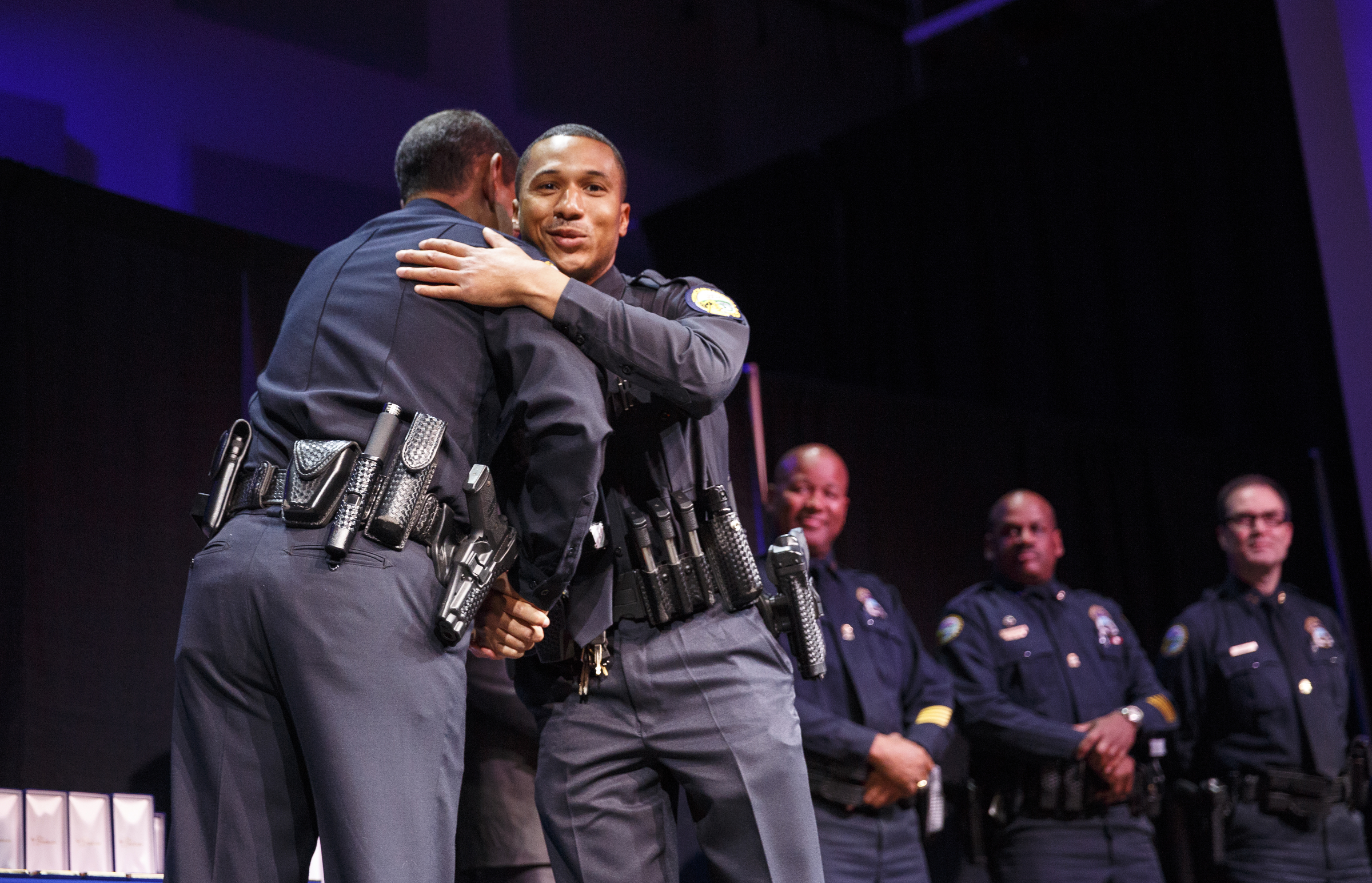 Chief Fred Fletcher presents Officer Jamaal A. Noble the Rookie of the Year award during the Chattanooga Police Department's annual awards ceremony held at Calvary Chapel on Thursday, May 26, 2016, in Chattanooga, Tenn. In addition to normal awards, officers were awarded for their response to last year's July 16 shootings at two military facilities in Chattanooga.