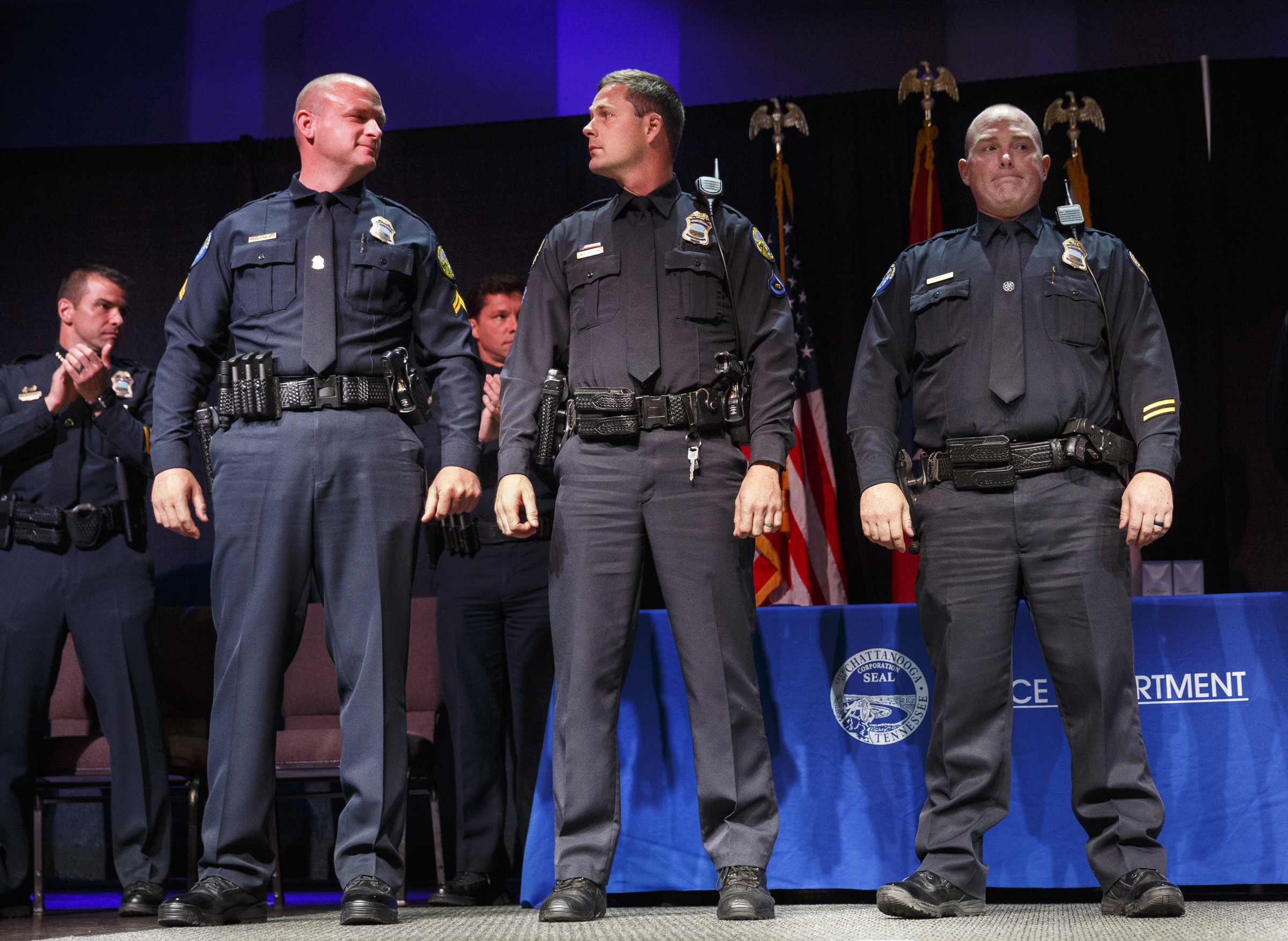 Chattanooga police officers O'Brien, Flanagan, and Timmons, from left, are among four who received the Medal of Valor during the Chattanooga Police Department's annual awards ceremony held at Calvary Chapel on Thursday, May 26, 2016, in Chattanooga, Tenn. The quartet of officers received the medals for their actions during last July's shootings at area military facilities.