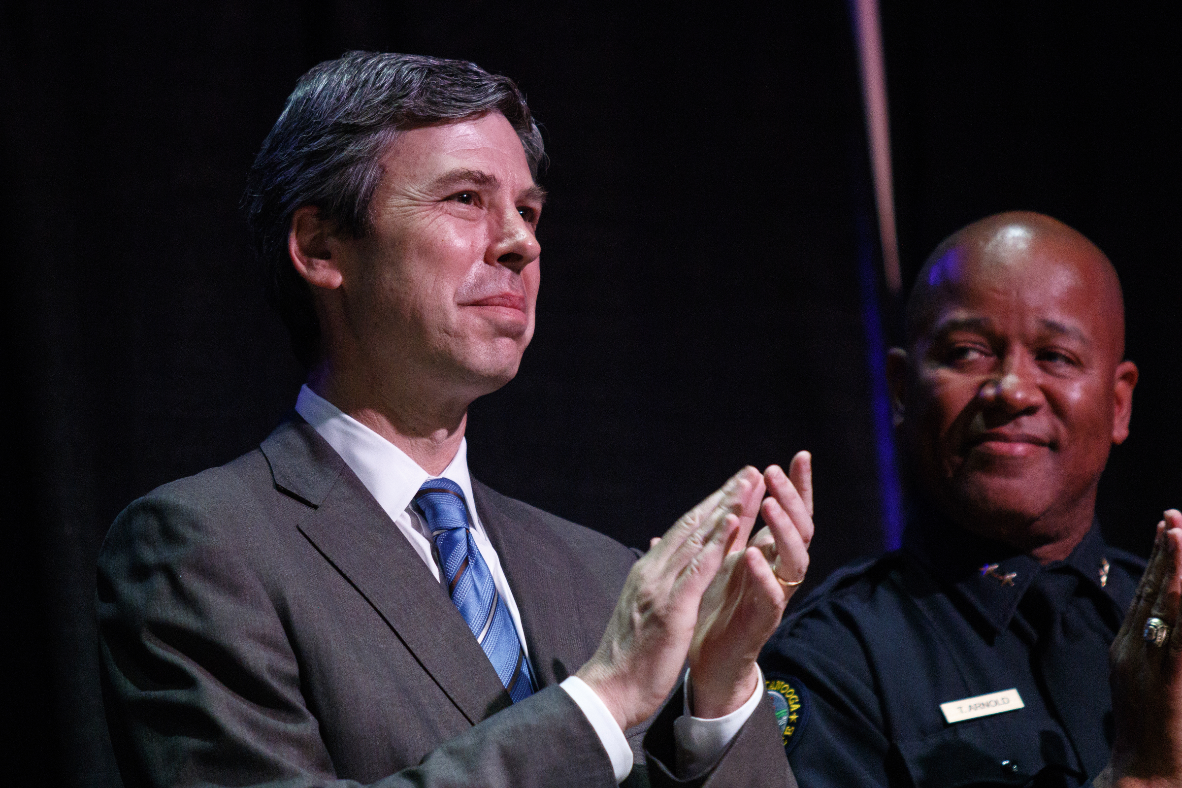 Mayor Andy Berke applauds during the Chattanooga Police Department's annual awards ceremony held at Calvary Chapel on Thursday, May 26, 2016, in Chattanooga, Tenn. In addition to normal awards, officers were awarded for their response to last year's July 16 shootings at two military facilities in Chattanooga.