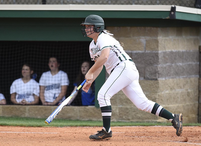 Silverdale's Lindsey Newell (34) watches as her home run goes over the fence and rolls across Bonny Oaks Drive.  The Gordonsville Tigers visited Silverdale Baptist Academy in a TSSAA Sectional matchup Saturday May 21, 2016.