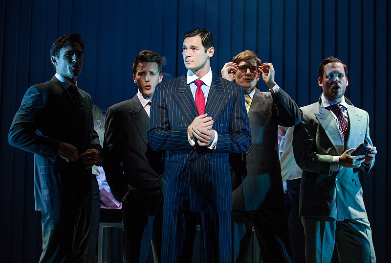 
              This image released by Jeffrey Richards Associates shows Benjamin Walker, center, and the cast during a performance of "American Psycho," opening at the Gerald Schoenfeld Theatre in New York. Producers of the adaptation of the once-controversial novel by Bret Easton Ellis said Thursday will close June 5 after 81 performances. (Jeremy Daniel/Jeffrey Richards Associates via AP)
            
