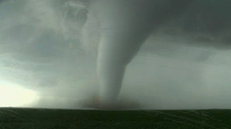 
              This image made from a Tuesday, May 24, 2016 video by KWTV-KOTV, shows a funnel cloud moving across the field near Dodge City in Ford County, Kan. Crews are evaluating the damage Wednesday after tornadoes destroyed several homes in western Kansas as a series of severe storms swept across the Plains. (KWTV-KOTV via AP)
            
