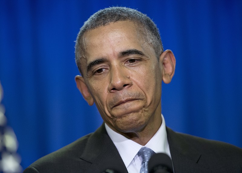 President Barack Obama pauses as he speaks during a news conference at the Shima Kanko Hotel in Shima, Japan, Thursday, May 26, 2016, after the end of the third working session of the G-7 Summit. (AP Photo/Carolyn Kaster)