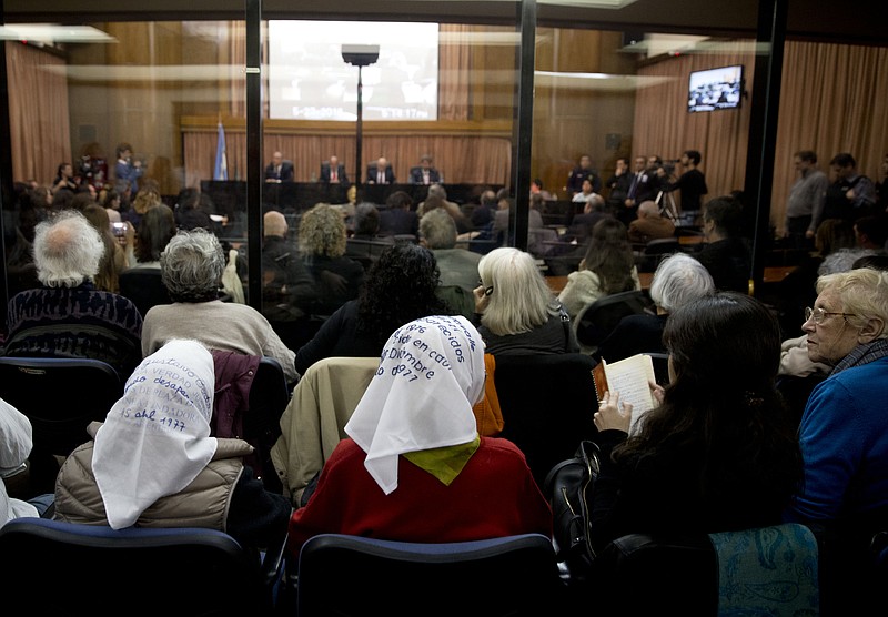 
              Nora de Cortinas, president of the Argentine group Mothers of the Plaza de Mayo, sits with member of the group, Mirta Baravalle, in federal court to hear the sentence for  former military officers in Buenos Aires, Argentina, Friday, May 27, 2016. A court in Argentina will deliver the sentence on a long-awaited human rights trial focused on Operation Condor, a secret operation launched by six South American dictators in the 1970's that was a coordinated effort to track down their enemies and eliminate them. (AP Photo/Natacha Pisarenko)
            