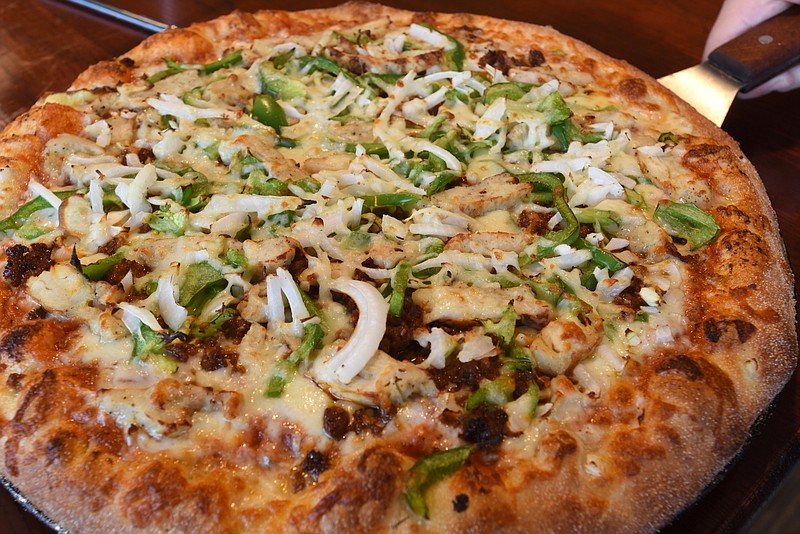 Zachary Schreeder created a pizza for a pizza creation contest for Marco's employees.