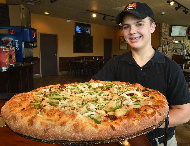 Zachary Schreeder created a Chicken Chorizo Pizza, a recipe that won him the national pizza-creation contest for Marco's Pizza.