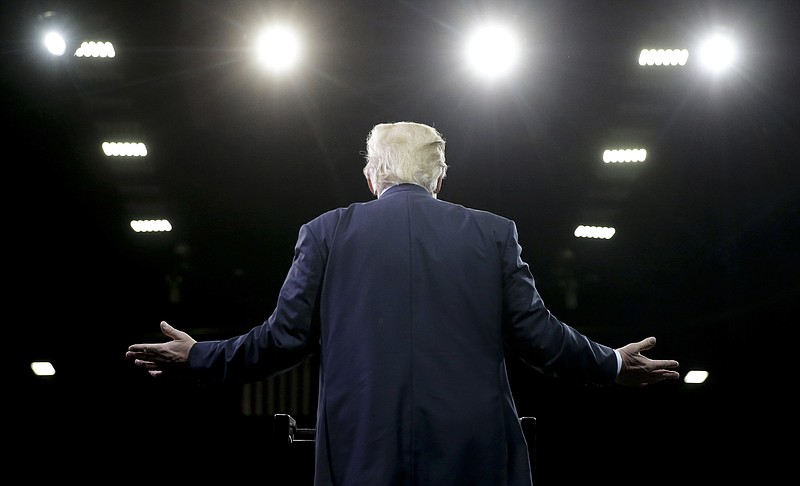 
              In this May 27, 2016, photo Republican presidential candidate Donald Trump speaks during a rally in Fresno, Calif. It started with Mexicans being publicly accused by Trump of being criminals and rapists. It escalated to ejections, to sucker punches, to pepper spray. And now violence and strife seems to be a commonplace occurrence out on the campaign trail. (AP Photo/Chris Carlson)
            