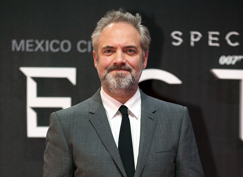 
              FILE - In this Monday, Nov. 2, 2015 file photo, director Sam Mendes poses for photographers at the regional premiere of the latest James Bond film, "Spectre," at the National Auditorium in Mexico City. Sam Mendes, the acclaimed British director of "Skyfall" and "Spectre", said Saturday, May 28, 2016 he will not direct the next installment in the James Bond series. "It was an incredible adventure, I loved every second of it," Mendes said of his five years working on the thriller franchise. "But I think it's time for somebody else." (AP Photo/Rebecca Blackwell, file)
            