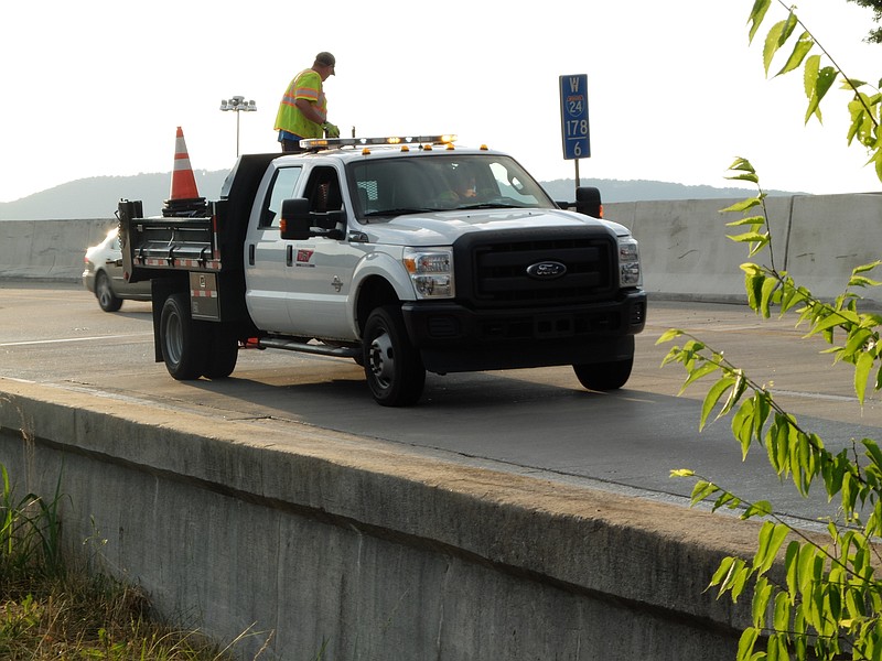 TDOT closes the eastbound right lane on Interstate 24, at the 178/6 mile-marker late Sunday. 
Bridge Inspector Jason Tays was first on the scene to check into reports of a hole in the second span of the bridge directly over Chestnut Street in downtown Chattanooga.