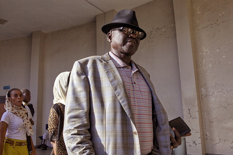 
              FILE-In this Monday, Sept. 7, 2015 file photo, Souleymane Guengueng, a former Chad prisoner and victim, arrives at court as a witness to testify during the trail of former Chadian dictator Hissene Habre in Dakar, Senegal. Souleymane Guengueng was among thousands imprisoned in Chad during the 1982-1990 rule of dictator Hissene Habre. On Monday, May 30, 2016, he is certain that justice will be delivered. (AP Photo/Jane Hahn,File)
            