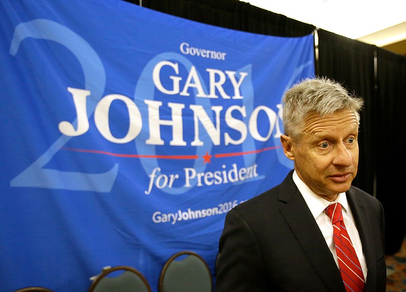 
              FILE - In a Friday, May 27, 2016 file photo, Libertarian presidential candidate Gary Johnson speaks to supporters and delegates at the National Libertarian Party Convention, in Orlando, Fla. Omn Sunday, May 29, 2016, The Libertarian Party again nominated former New Mexico Gov. Johnson as its presidential candidate, believing he can challenge presumptive Republican nominee Donald Trump and Democratic front-runner Hillary Clinton because of their poor showing in popularity polls.  (AP Photo/John Raoux, File)
            