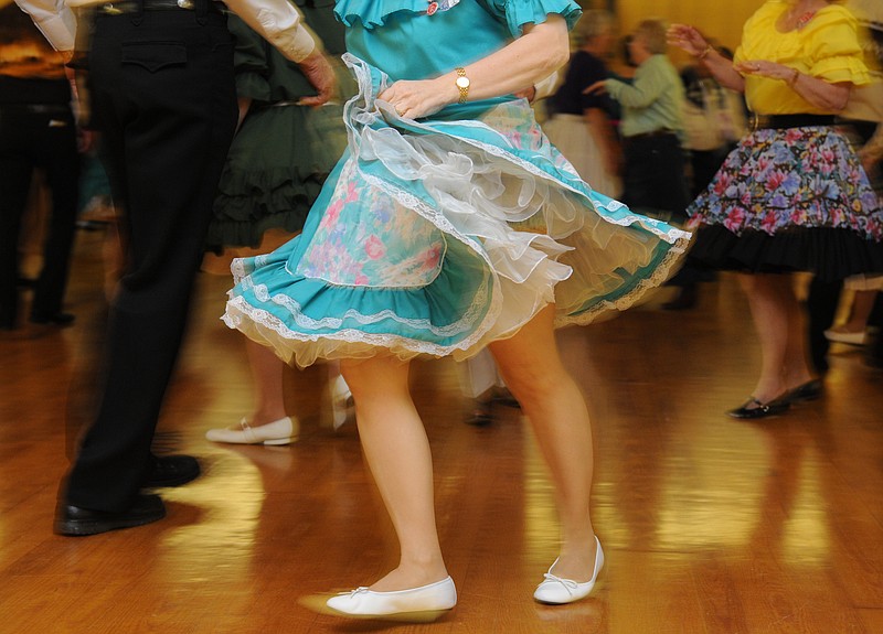 A dancer twirls her skirts during square dancing at Allemande Hall on Standifer Gap Road in Chattanooga.