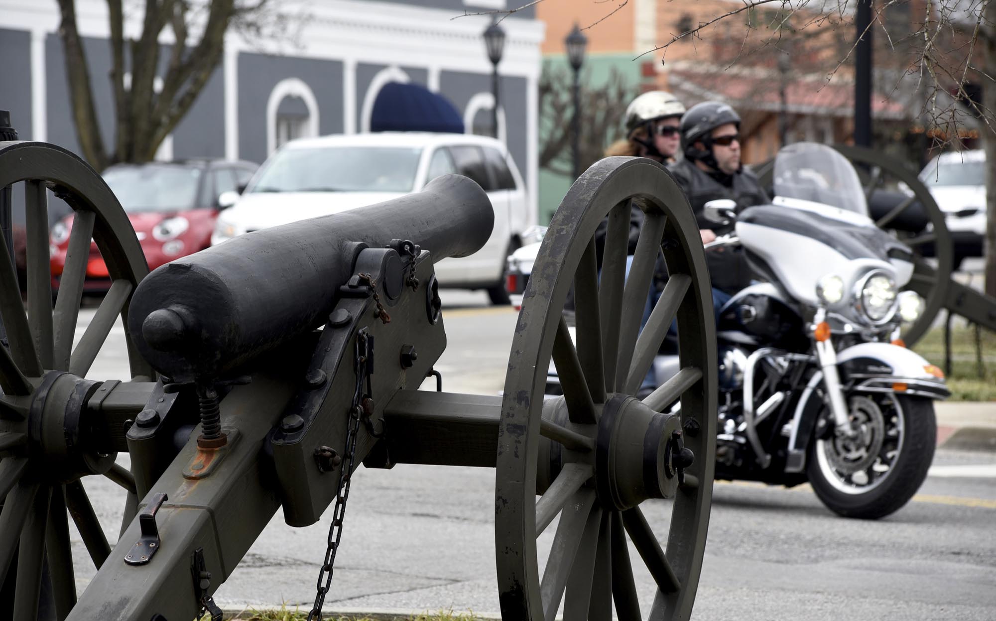 Traffic passes between cannons at the intersection of Lee Avenue, Gordon Street and Cove road on Wednesday, Feb. 17, 2016, in the center of Chickamauga, Ga.
