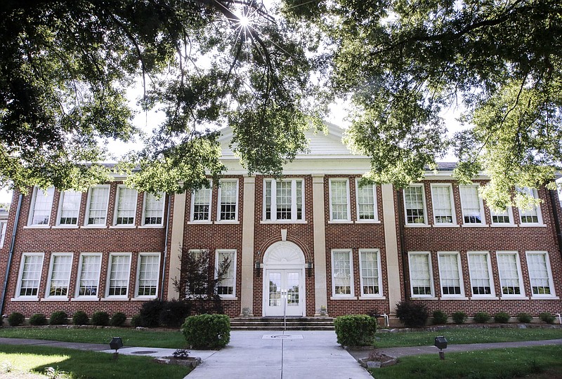 The Gordon Lee building, one of two proposed for replacement, is seen before a Chickamauga City School Board meeting held Tuesday, June 2, 2015, at Gordon Lee High School in Chickamauga, Ga., to inform the public about plans for two 1930s-era buildings on campus. The board's proposal for solving problems related to the age of the buildings includes building new historically-accurate buildings in front of the old ones before demolishing them.