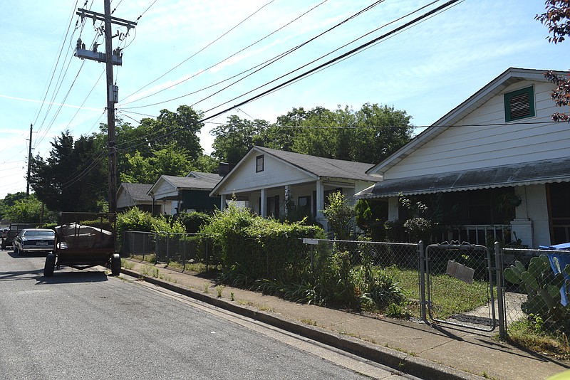 Houses line the Cleveland Street across from Lincold Park May 31, 2016.