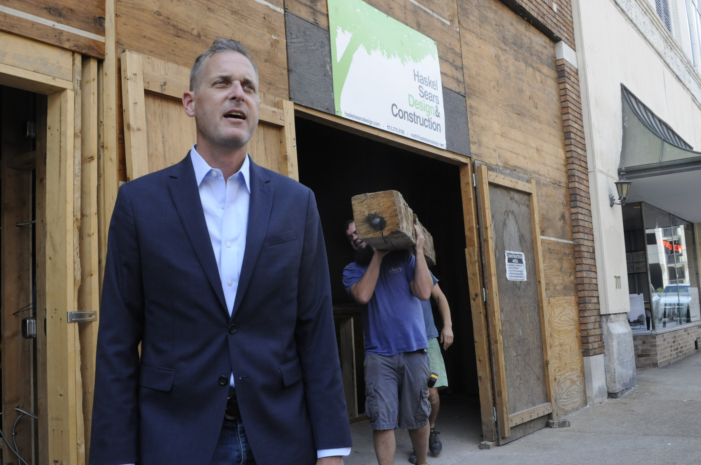 Christian Rushing talks about the new offices of his Chattanooga Design Studio amidst construction inside the former Cooper Office Supply on Cherry Street.