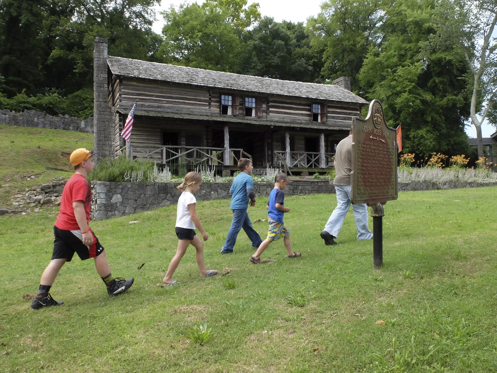 A local family tours the grounds at the Chief John Ross House located in Rossville, Ga.