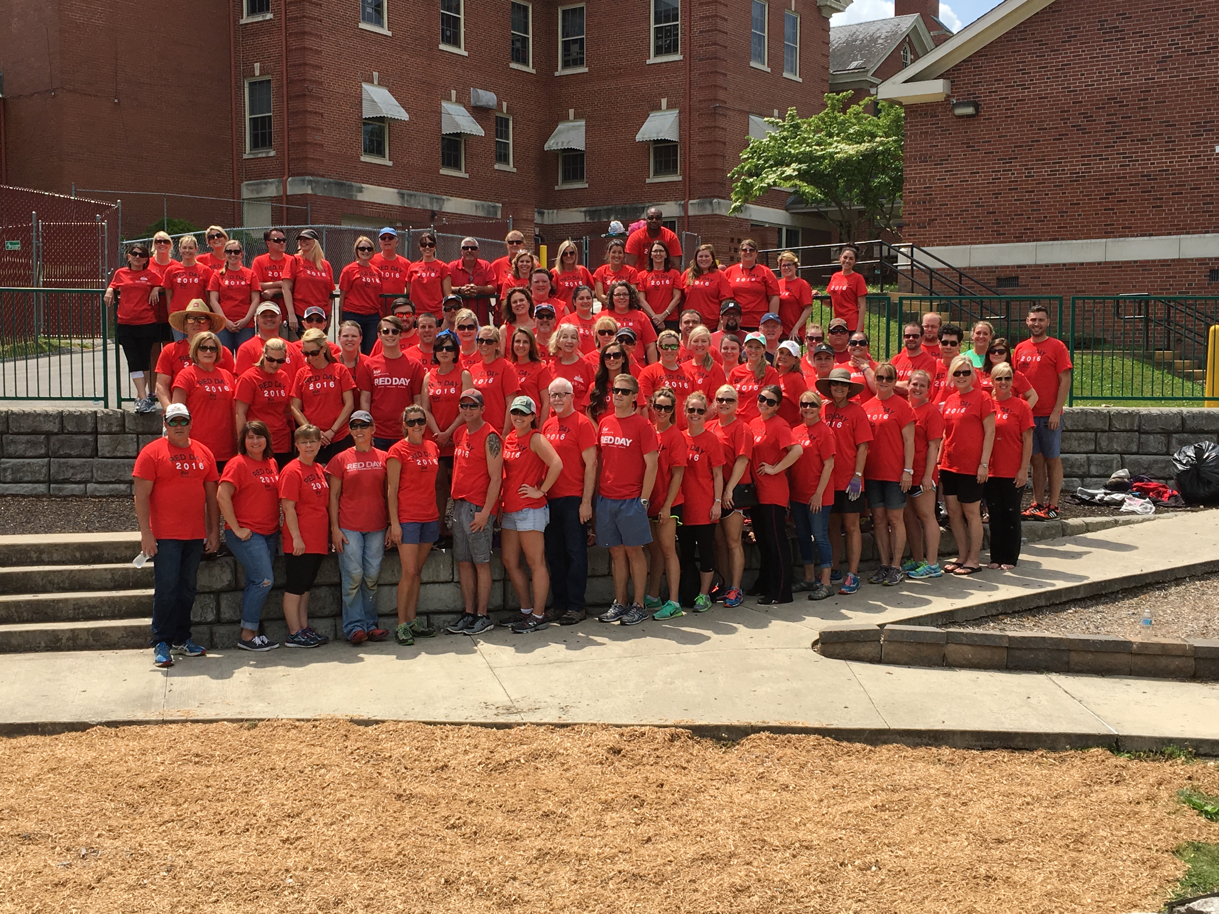 More than 100 agents and staff members from Keller Williams Greater Downtown Realty gather to spend the day volunteering at Chambliss Center for Children.