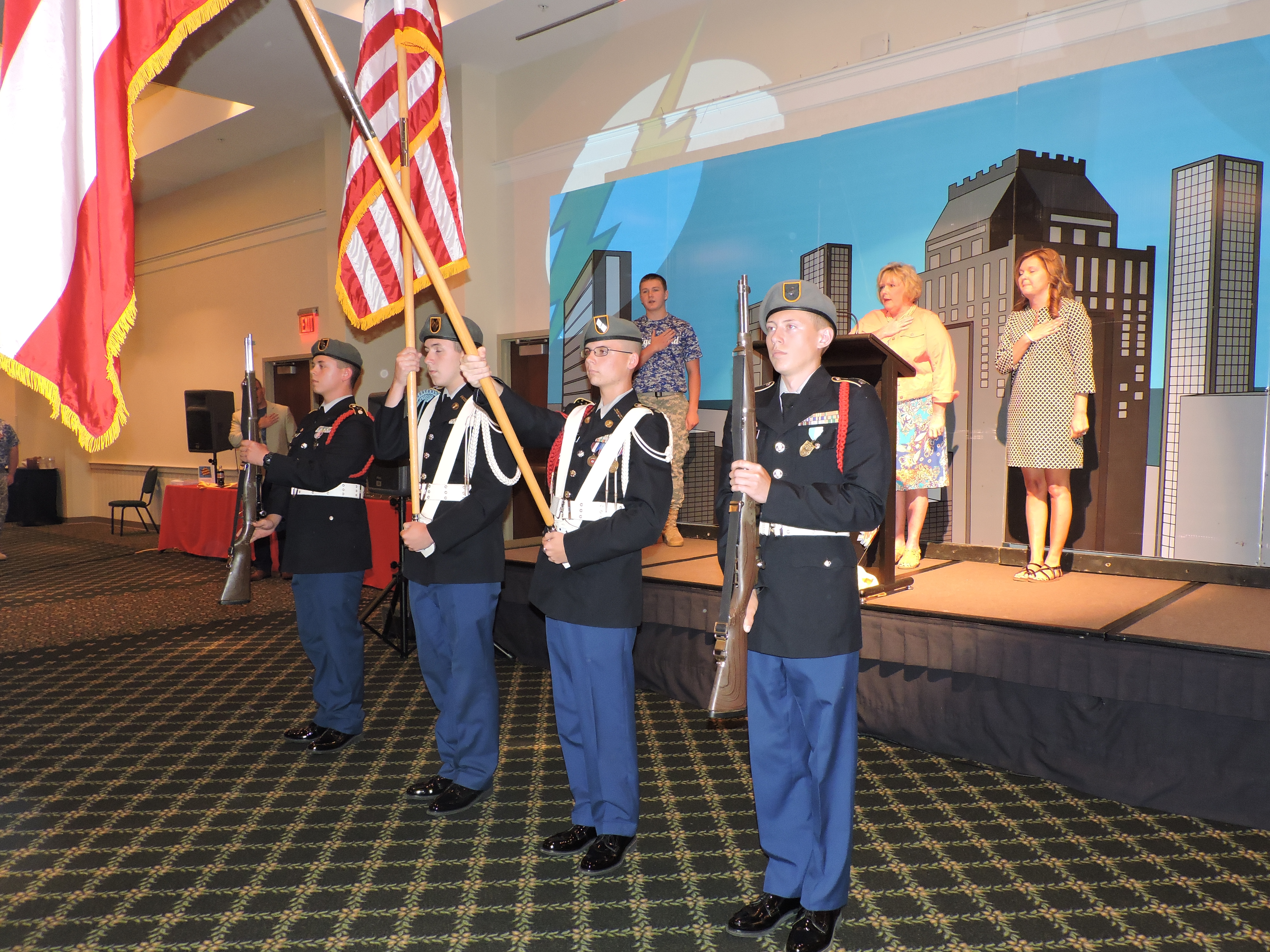 Ringgold High School Junior Reserve Officer Training Corps cadets present the colors at the "Not All Superheroes Wear Capes" Partnership 2000 Annual Recognition Luncheon.