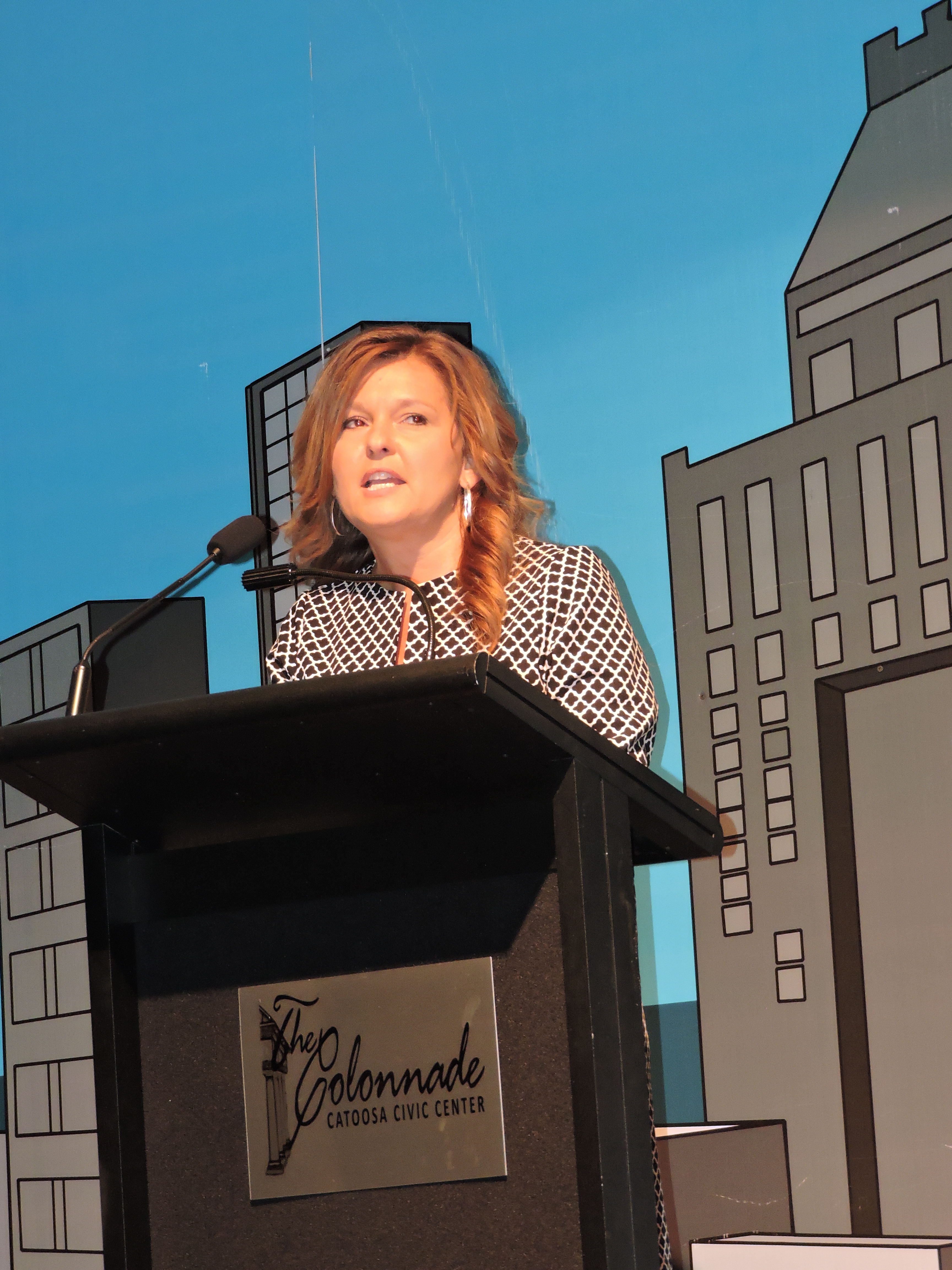 Partnership 2000 Coordinator Buffy Hemphill thanks the business and community partners that help Catoosa County students at the Colonnade. "Each person here today is motivated to help students in Catoosa County," she said.