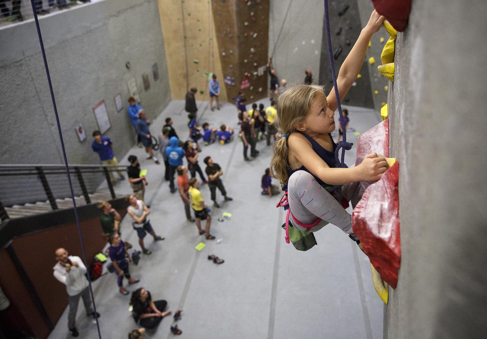 Lily Austin climbs a top rope route while competing in the Youth D division of the USAC Local Youth Sport and Speed climbing competition at High Point Climbing gym on Saturday, Feb. 27, 2016, in Chattanooga, Tenn. The competition followed the redpoint format, where the scores for competitors' top three completed sport routes are combined for a final score.