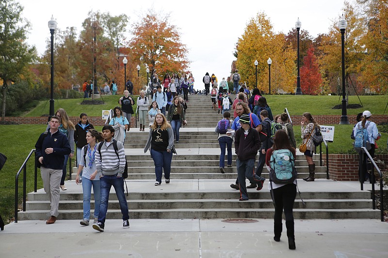 Students walk to class Wednesday, Nov. 12, 2014, on the campus of the University of Tennessee at Chattanooga.