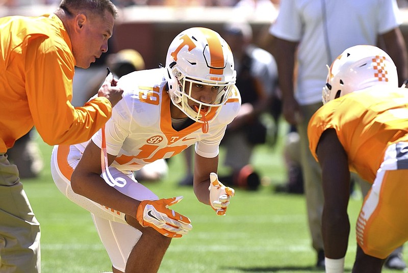 Tennessee coach Butch Jones oversees a blocking drill with Jeff George at the Orange & White game in April. George is a junior college transfer and among the Vols' new receivers who need to make an immediate impact.