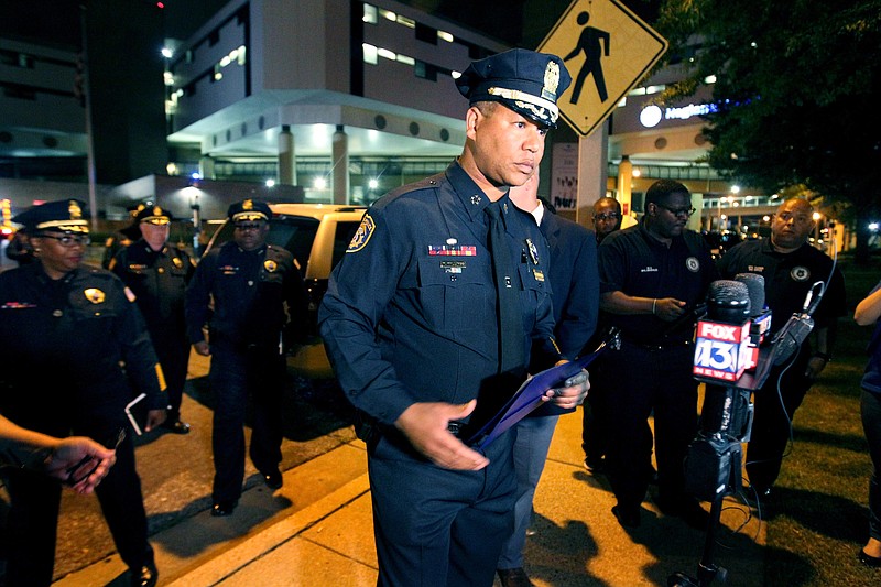 
              Memphis Police Department Interim Director Michael Rallings prepares to brief the media outside Regional Medical Center, early Sunday, June 5, 2016, where Officer Verdell Smith died after he was struck late Saturday by a fleeing vehicle of a man suspected in a downtown shooting, in Memphis, Tenn. (Nikki Boertman/The Commercial Appeal via AP) MANDATORY CREDIT
            