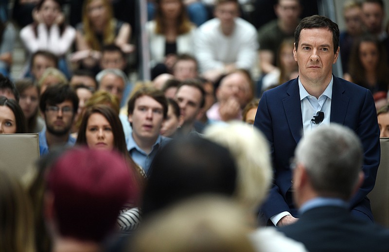 
              Britain's Chancellor of the Exchequer, George Osborne, listens to a question at a corporate centre in Bournemouth, southern England, Friday June 3, 2016. Speaking during the visit to the south coast, the Chancellor accused "Brexit" campaigners of being "dishonest" by pretending that the economy would not suffer if those wishing to leave triumphed in the EU referendum. (Andrew Matthews/PA via AP)  UNITED KINGDOM OUT  
            