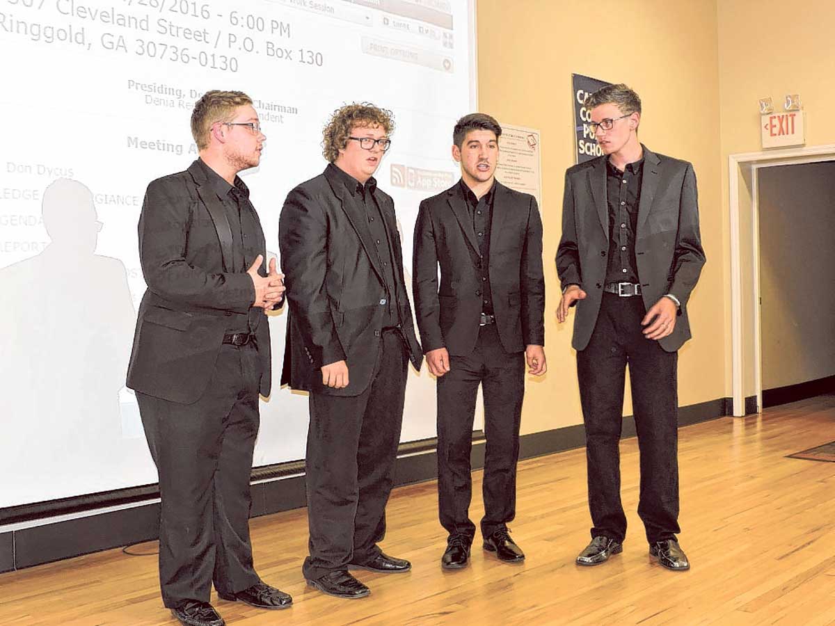 The Heritage High School Quartet performs songs for the Catoosa County Board of Education.