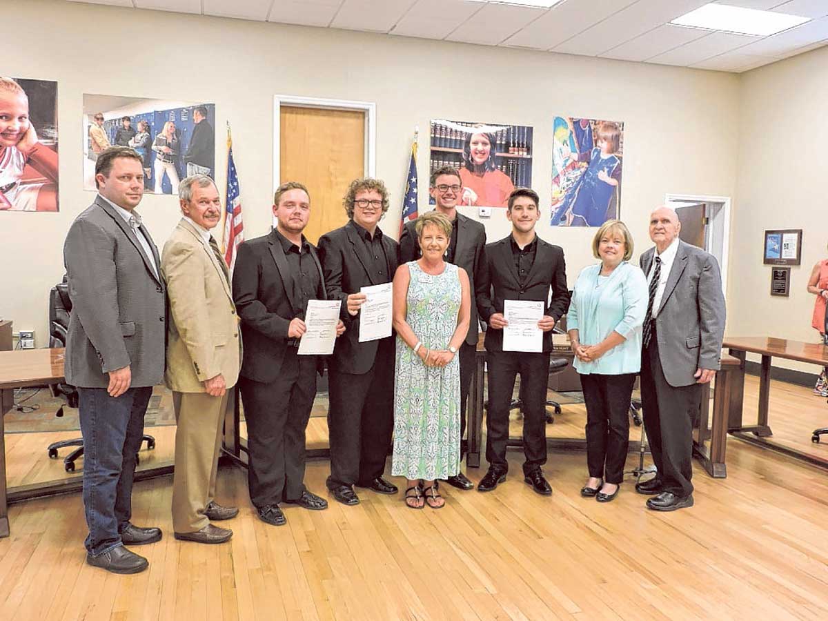 Heritage High School Men's Quartet won the Georgia State High School's Literary Meet, so the Catoosa County Board of Education is recognizing them for their achievement.