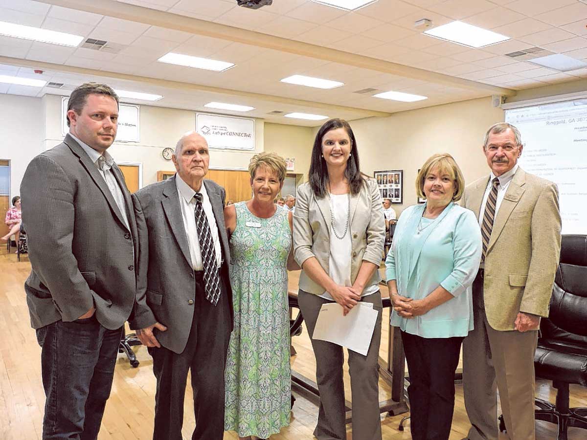 Melissa Butler, fourth from left, is named the Leadership Shining Star. From left, Catoosa County Board of Education members David Moeller, Melvin Edwards, Superintendent Denia Reese, Gloria Hunt and Chairman Don Dycus take part in the awards presentation.
