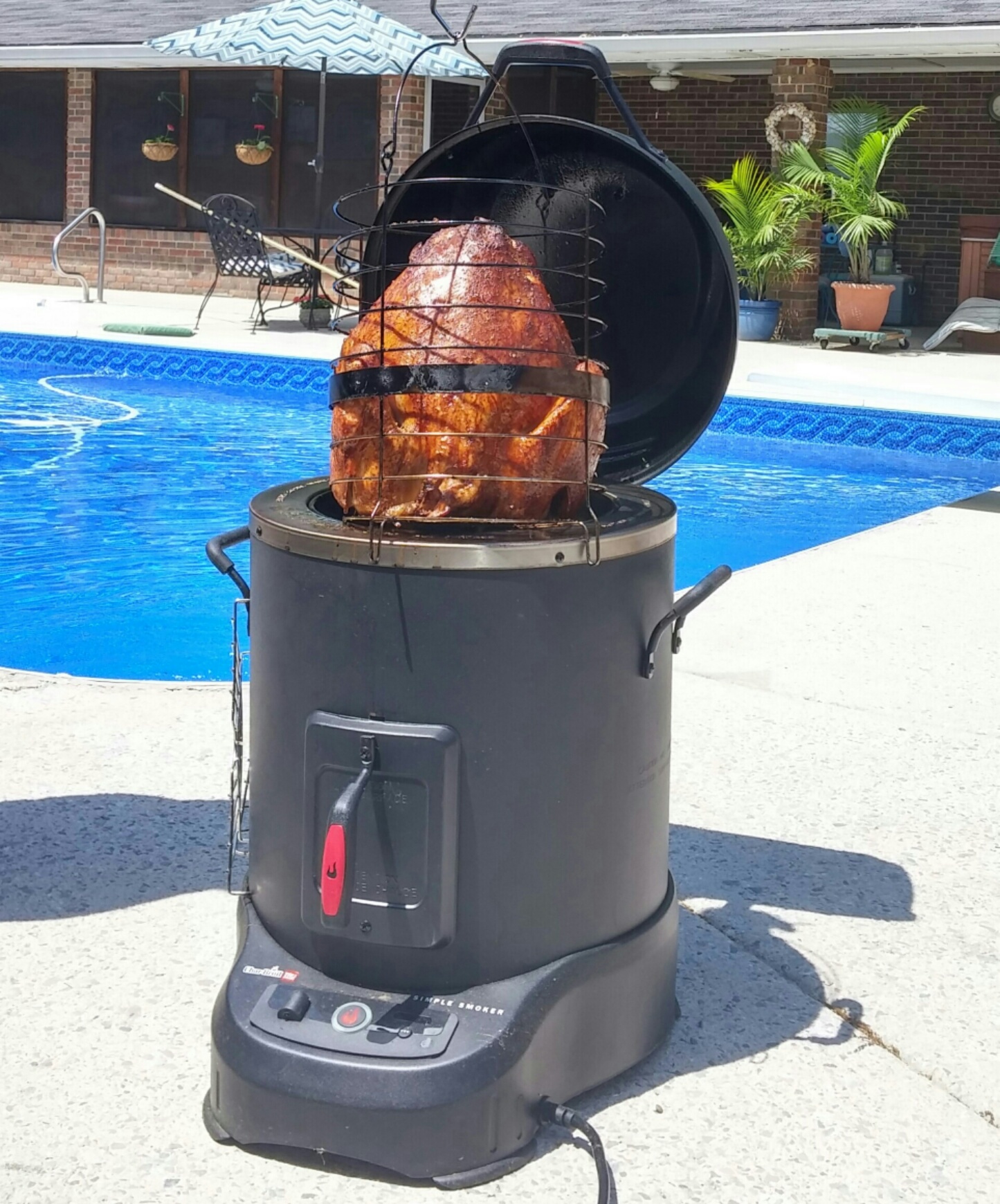You don't have to leave your easy chair to smoke foods with the Char-Broil Connected Smoker, which can be controlled by a smartphone app.