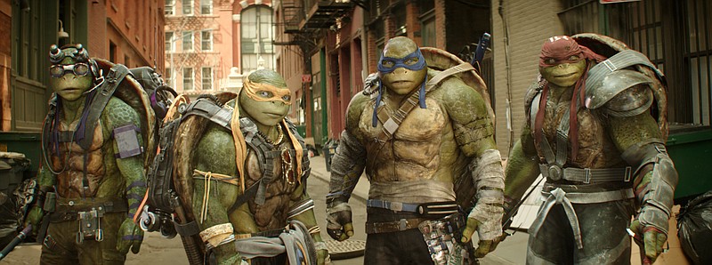 
              This image released by Paramount Pictures shows, from left, Donatello, Michelangelo, Leonardo and Raphael in a scene from "Teenage Mutant Ninja Turtles: Out of the Shadows." The movie opened to $35.3 million according to comScore estimates Sunday, June 5, 2016, close to half of what the first film opened to in 2014. (Lula Carvalho/Paramount Pictures via AP)
            
