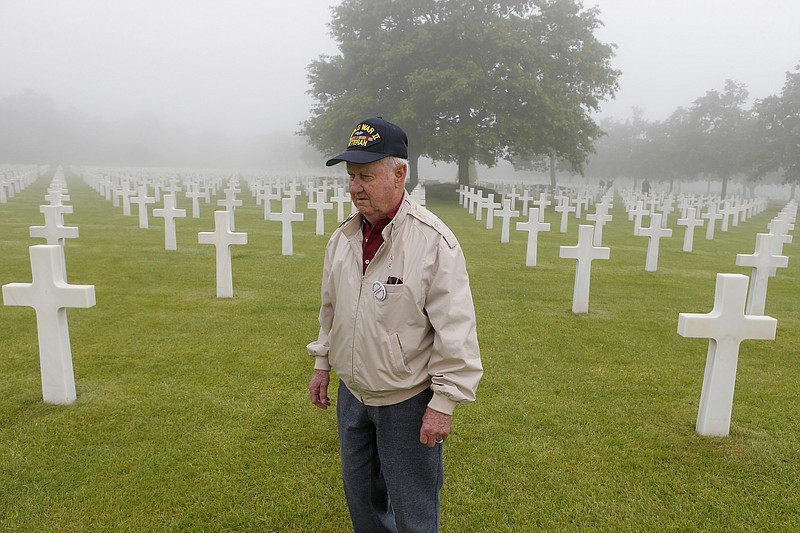 Henry Breton, a 91-year-old veteran from Augusta, Maine, who landed on the beach soon after dawn on D-Day in 1944 with the 106th Infantry Division, walks to pay respects and share memories with other survivors in the Colleville American military cemetery, in Colleville sur Mer, western France, Monday June 6, 2016, on the 72nd anniversary of the D-Day landing. D-Day marked the start of a Europe invasion, as many thousands of Allied troops began landing on the beaches of Normandy in northern France in 1944 at the start of a major offensive against the Nazi German forces, an offensive which cost the lives of many thousands.