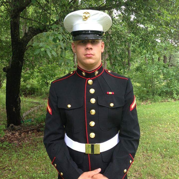 
              In this June 2013 family handout photo provided by Jessie Kelly, Marine Lance Cpl. Brandon Garabrant is seen in his military uniform in Greenfield, N.H., before he was killed in the line of duty, June 20, 2014, in Afghanistan. When Garabrant graduated from high school he wanted to wear his Marine uniform but school officials said policy bans uniforms and requires graduates to wear blue caps and gowns. A new state law passed this year now allows high school graduates to wear their military uniforms if they have completed basic training. (Jessie Kelly via AP)
            