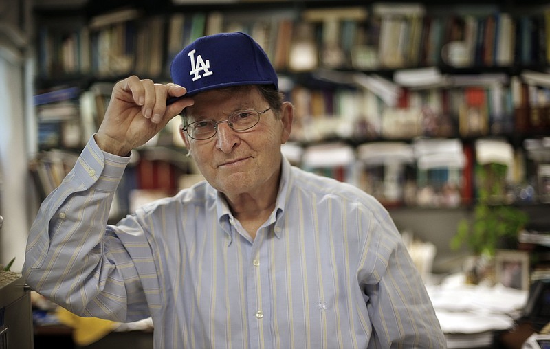 
              ADDS  HAMILTON WAS PART OF A TEAM - Physics professor, and lifelong fan of the Los Angeles Dodgers and Brooklyn Dodgers, Joe Hamilton poses in his Dodgers cap in his office at Vanderbilt University Wednesday, June 8, 2016, in Nashville, Tenn. Hamilton, was part of a team that discovered a new element and named  tennessine after Tennessee, making it the second element named after a state. Californium is the first. (AP Photo/Mark Humphrey)
            
