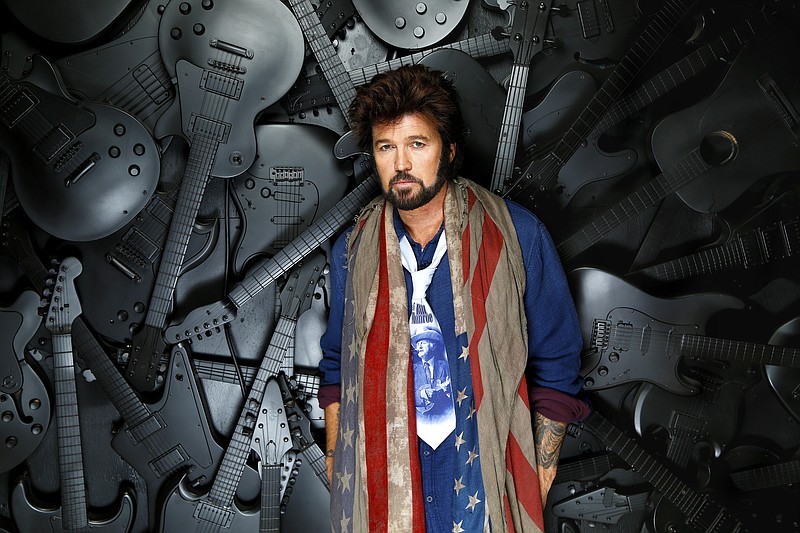 
              In this Dec. 11, 2015 photo, Billy Ray Cyrus poses for a photo at the Municipal Auditorium in Nashville, Tenn. In his latest role for the new CMT comedy series “Still the King,” the “Achy Breaky Heart” singer-turned-actor portrays a washed up country star-turned-Elvis impersonator, which premieres June 12, 2016.  (Photo by Donn Jones/Invision/AP)
            